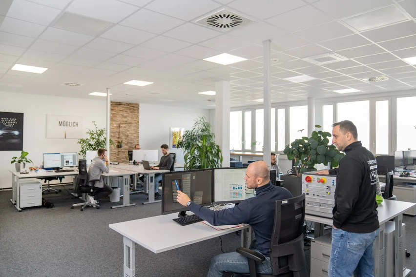 Your working environment: colleagues, software and test hardware at the same workplace.